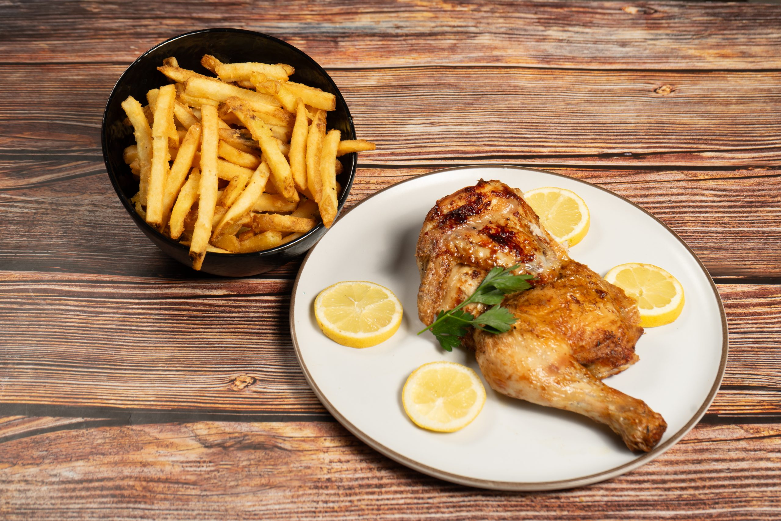 Medio pollo con patatas